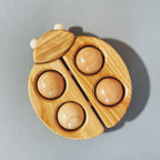 Mariquita de madera con ruedas – BAJO