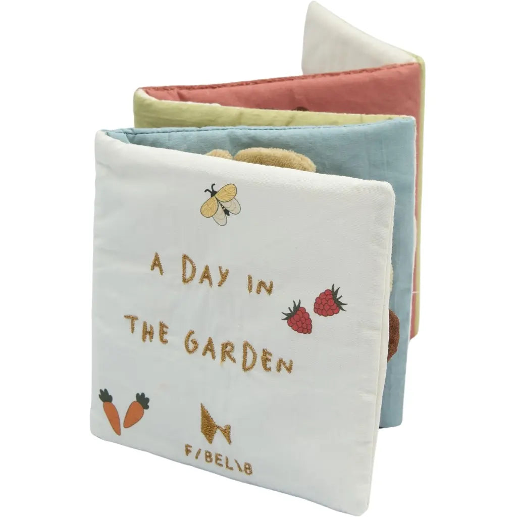Libro sensorial de tela Jardín – Fabelab